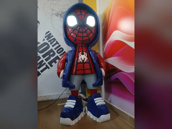 Large 3D-printed character statue with illuminated eyes